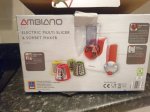 Electric grater/slicer and sorbet maker reduced