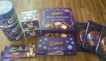 Cadbury's instore at Heron Foods - Tin of Fingers 2 boxes of biscuits £1, 3 packs tree decorations £1