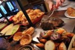 Get a carvery and either unlimited soft drink, pint of beer or cider or glass of wine for 2 - £7.48