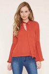 Upto 70% off sale plus free delivery on everything eg tie neck blouse