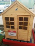 To wooden playhouse