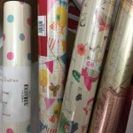 Wrap, tags, gifts etc at Clintons. E. g. wrapping paper x5