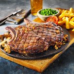 32oz Bulls Head rib eye steak £13.99 (30% off all food) @ Flaming Grill Pubs