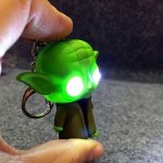 Yoda & Batman light up keyrings each using code